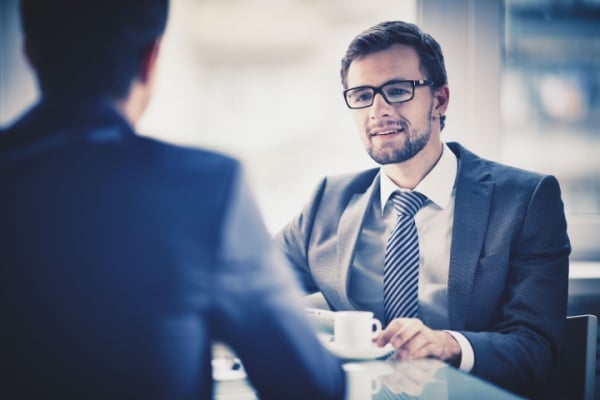 Two men having coffee