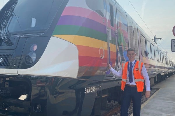 Max van den Berg next to a train